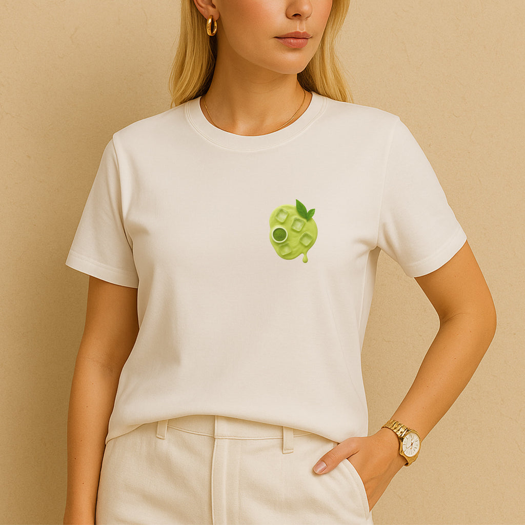 Woman wearing white Matcha Latte T-Shirt – front view with minimalist green chest print