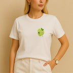 Woman wearing white Matcha Latte T-Shirt – front view with minimalist green chest print